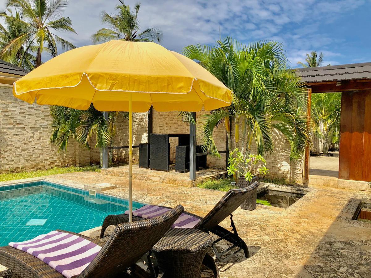 Amber Villas Diani Диани-Бич Экстерьер фото